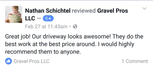 A facebook review of a driveway in the middle of an intersection.